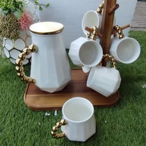 Luxurious tea set with golden handle